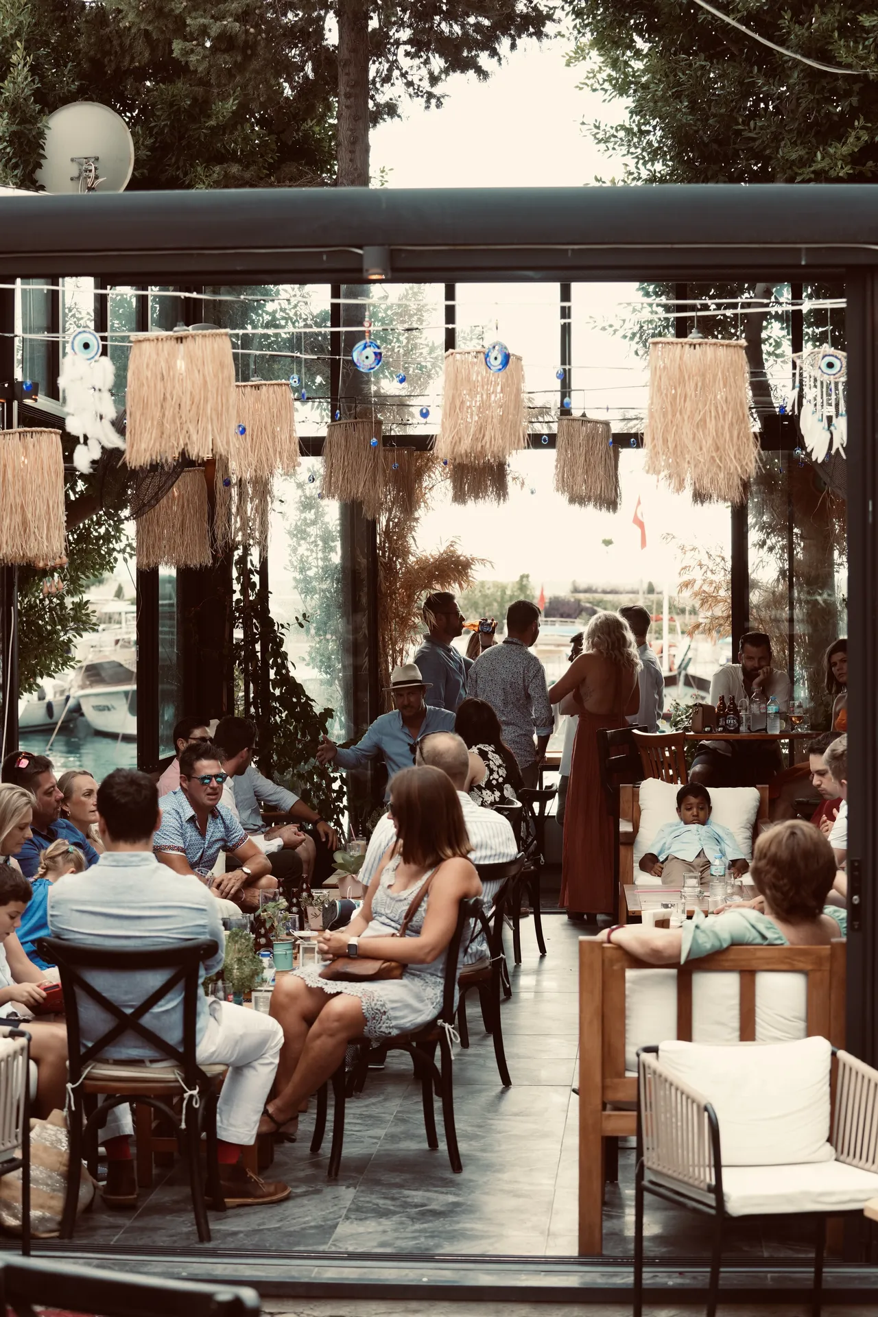 Beach club venue with evil eye decorations and bohemian styling